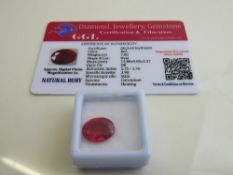 Oval cut red ruby, weight 7.00ct with certificate. Est £40-50