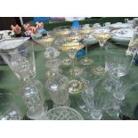 Blue glass tulip vase; 6 champagne glasses; 2 glass bottles; 2 whisky tumblers & qty of other