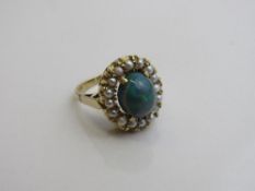 9ct gold, seed pearl & opal ring, size N 1/2, weight 5.5gms. Estimate £300-350
