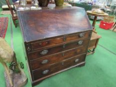 Early 19th century mahogany bureau with fitted interior over 4 graduated drawers on bracket feet, 92