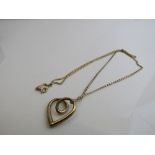 9ct gold heart pendant on 9ct gold chain, weight 5.6gms. Estimate £65-75