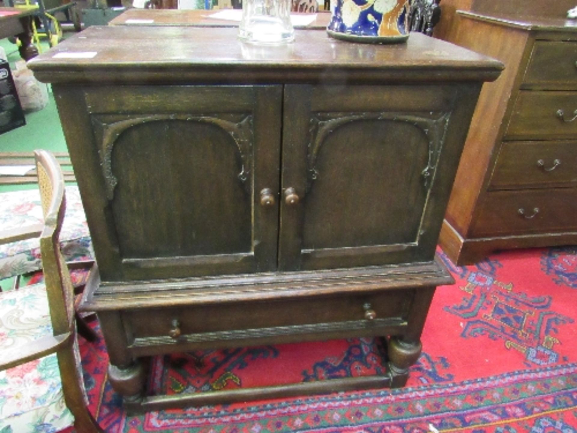 Oak small linen press on stand by William Spriggs & Co. Ltd, London. Drawer to base, 86 x 39 x