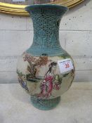 Relief decorated oriental vase, height 38cms. Estimate £10-20