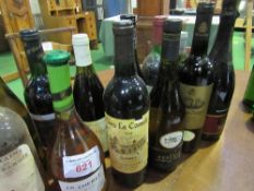 12 bottles of various wines & 1 bottle of liqueur. Estimate £30-40