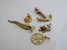 3no 9ct gold pendants Wt 5.0gms and 2 other pendants. Est £50-70