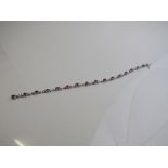 14ct white gold, ruby & diamond bracelet, length 19cms. Estimate £350-400