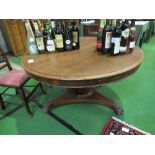 Mahogany circular table on central pedestal to 3 claw feet on casters, diameter 120cms. Estimate £