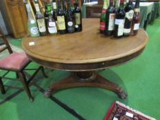 Mahogany circular table on central pedestal to 3 claw feet on casters, diameter 120cms. Estimate £