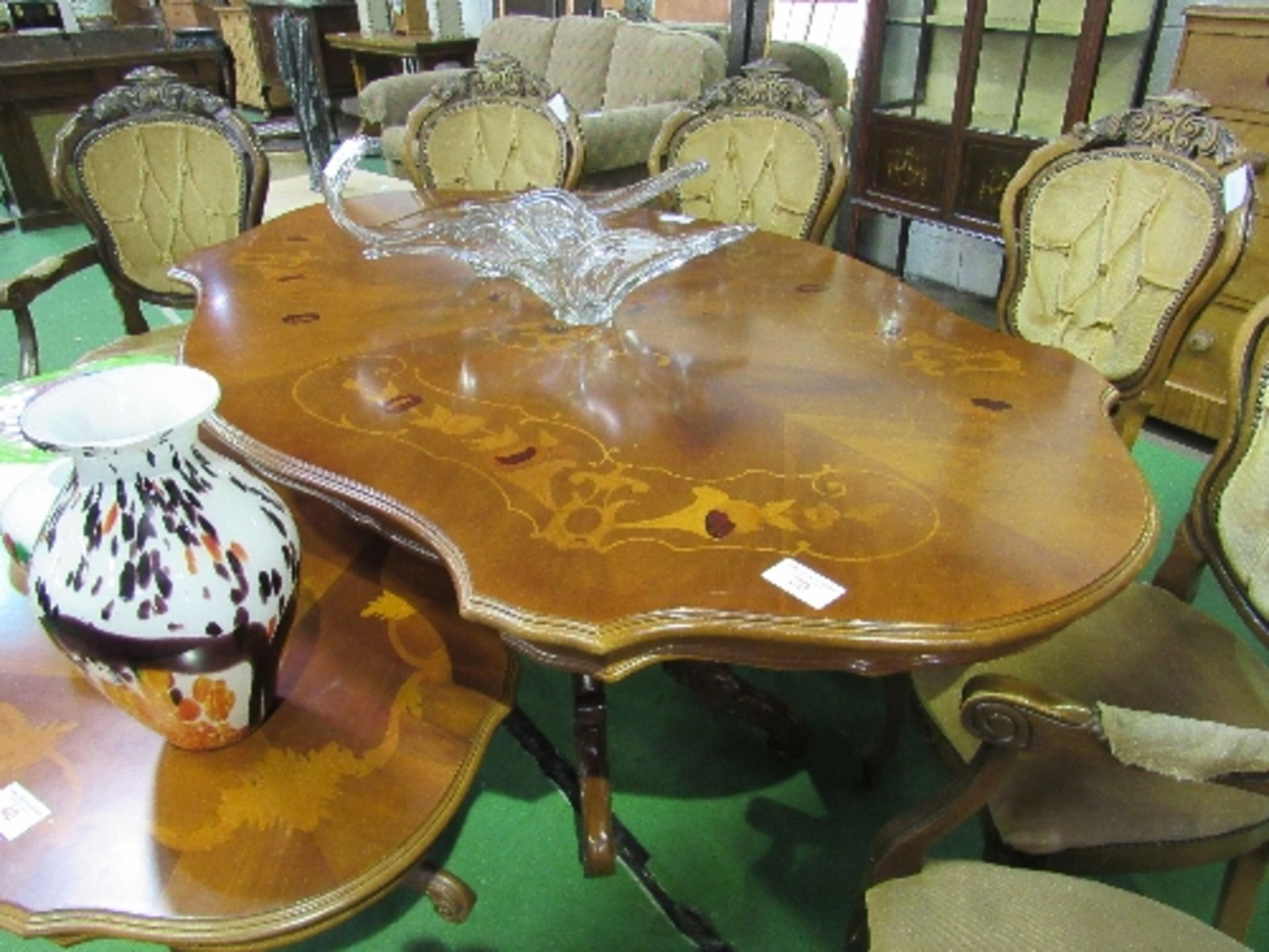 Inlaid shaped top dining table on heavy turned column to 4 shaped & carved legs. Estimate £40-60