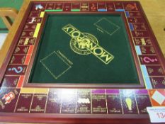 Franklin Mint 'Collector's Edition' traditional Monopoly set (glass top missing). Estimate £100-150
