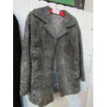 Grey Astrakhan jacket. Estimate £20-30