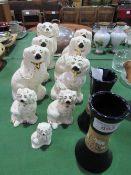 9 left hand facing Staffordshire dogs & 2 Doulton-type blue china vases. Estimate £10-20