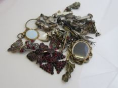 Quantity of antique costume jewellery including brooches, badges, pendants and miscellaneous