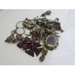 Quantity of antique costume jewellery including brooches, badges, pendants and miscellaneous
