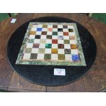 Vintage Pietra Dura circular table top with game board layout, 66cms diameter. Estimate £300-350