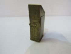 Brass vesta in the form of a lavatory. Estimate £20-30