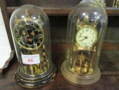 2 German anniversary clocks. Estimate £20-40