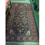 Dark orange & dark blue ground rug, 200 x 105cms. Estimate £20-30