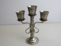 Persian silver 3 branch candelabra, height 14.5cms, 3.4ozt. Estimate £45-50