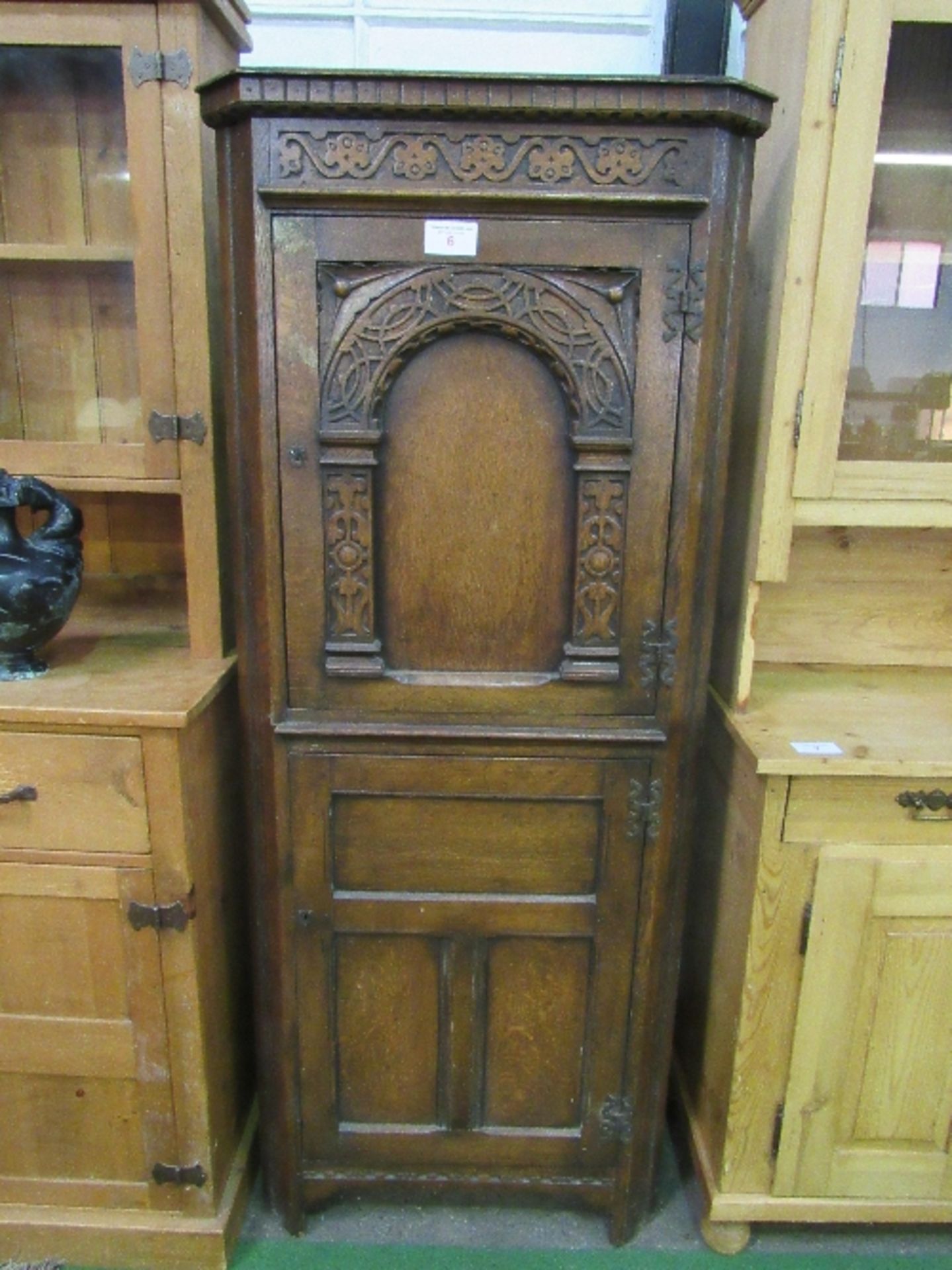 Oak corner cabinet with carved decoration to top cupboard, 70 x 38 x 176cms. Estimate £20-30