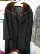 Black Astrakhan coat. Estimate £20-30