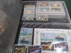 GB stamp assortment in album, Queen Elizabeth II collection in album & PHQ cards. Estimate £20-40
