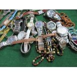 Cabinet containing assorted wristwatches & a belt buckle. Estimate £15-20