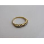 18ct gold & diamond half eternity ring, size N 1/2, weight 2.5gms. Estimate £150-180