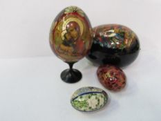 2 large & 2 small decorated wooden eggs. Estimate £15-25
