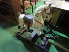 Child's wooden rocking horse. Estimate £20-40