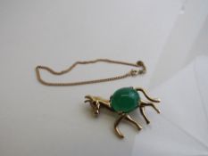 9ct gold donkey brooch set with green and red stones weight 6.9gms, 9ct gold fine chain bracelet