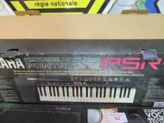 Yamaha PSR-3 portatone keyboard together with Jim Deacon bass guitar. Estimate £30-50