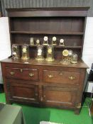 Georgian oak & elm Welsh dresser of 2 open shelves over 2 drawers & 2 cupboards. Estimate £200-250