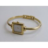 Gucci 1900L gold plated lady's watch with bracelet strap, serial no. 0243663. Estimate £80-100