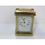 Brass cased carriage clock. Estimate £30-50