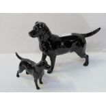 2 Beswick black Labradors. Estimate £20-40