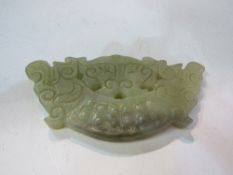 Carved jade buckle. Estimate £30-50