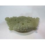 Carved jade buckle. Estimate £30-50