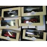 7 Corgi model European sports cars & a wooden plinth. Estimate £30-40