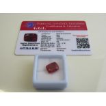 Cushion cut red ruby, weight 7.00ct with certificate. Est £40-50