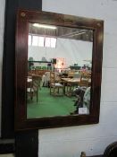 Ornate Regency-style figured mahogany wall mirror with twin inlays of boxwood stringing & faux