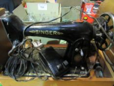Singer EJ435562 electric sewing machine in wooden case. Estimate £30-50
