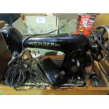 Singer EJ435562 electric sewing machine in wooden case. Estimate £30-50