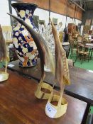 Pair of birds carved from cow horn. Estimate £20-30