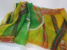 Silk Gucci scarf in original box. Estimate £20-30