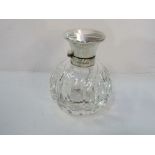 2 cut crystal perfume bottles with silver hinged engine turned decorated lids. Estimate £90-