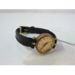 'Gucci' gold plated lady's watch with snake skin leather strap. Estimate £20-30