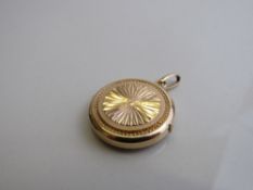 9ct gold topaz and white stone ring, weight 1.3gms size J, and a gold plated locket weight 9.8gms.