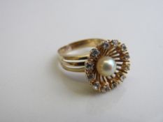 18ct pearl and white stone floral ring, weight 6.0gms. Est £150-160