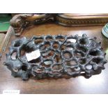 Chinese lattice hardwood stand carved to resemble twigs, 46 x 23cms. Estimate £20-30